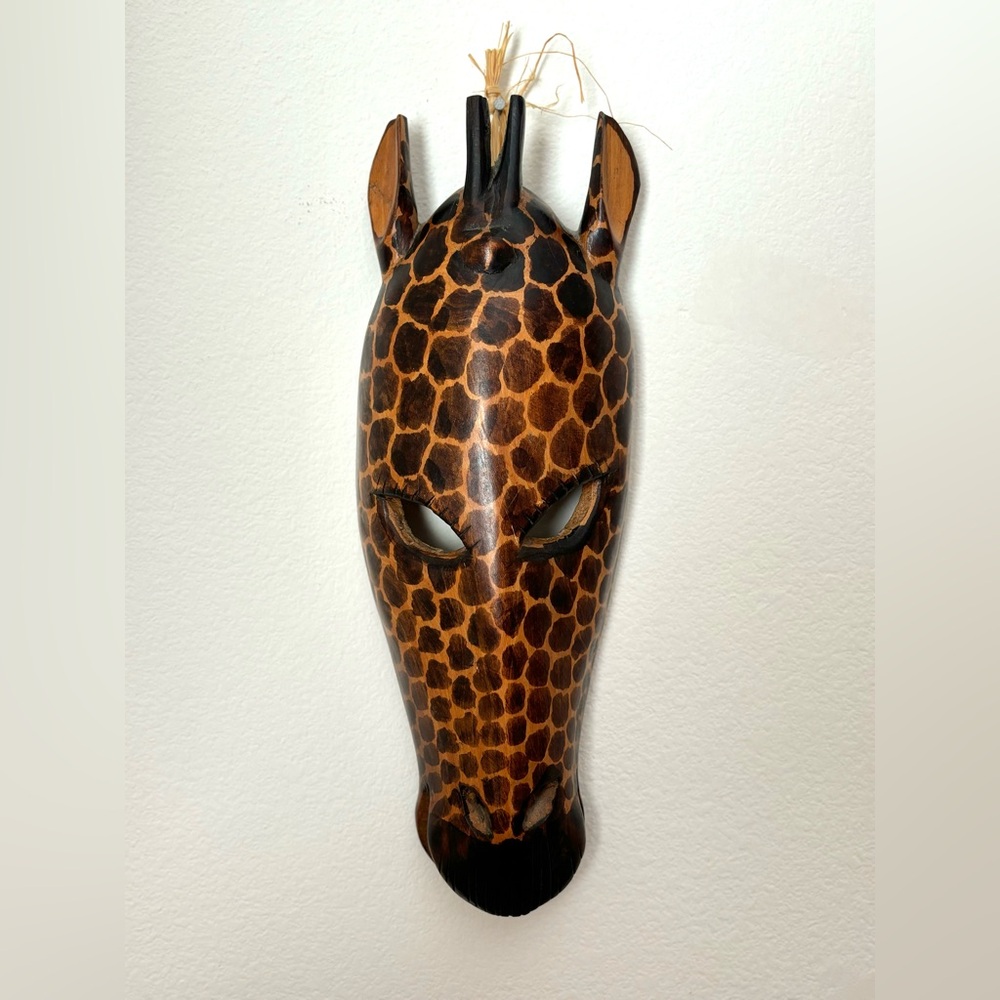 Carved wood hanging mask
